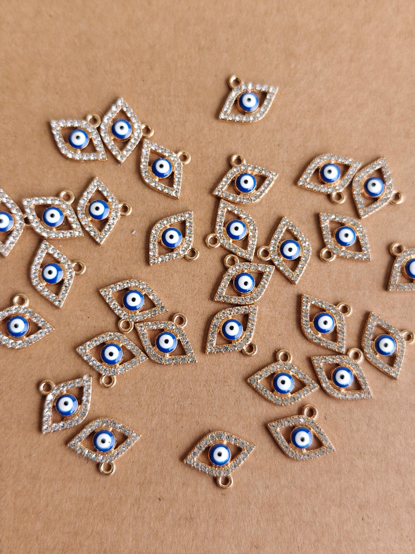 Leaf shaped Evil eye with stones charms