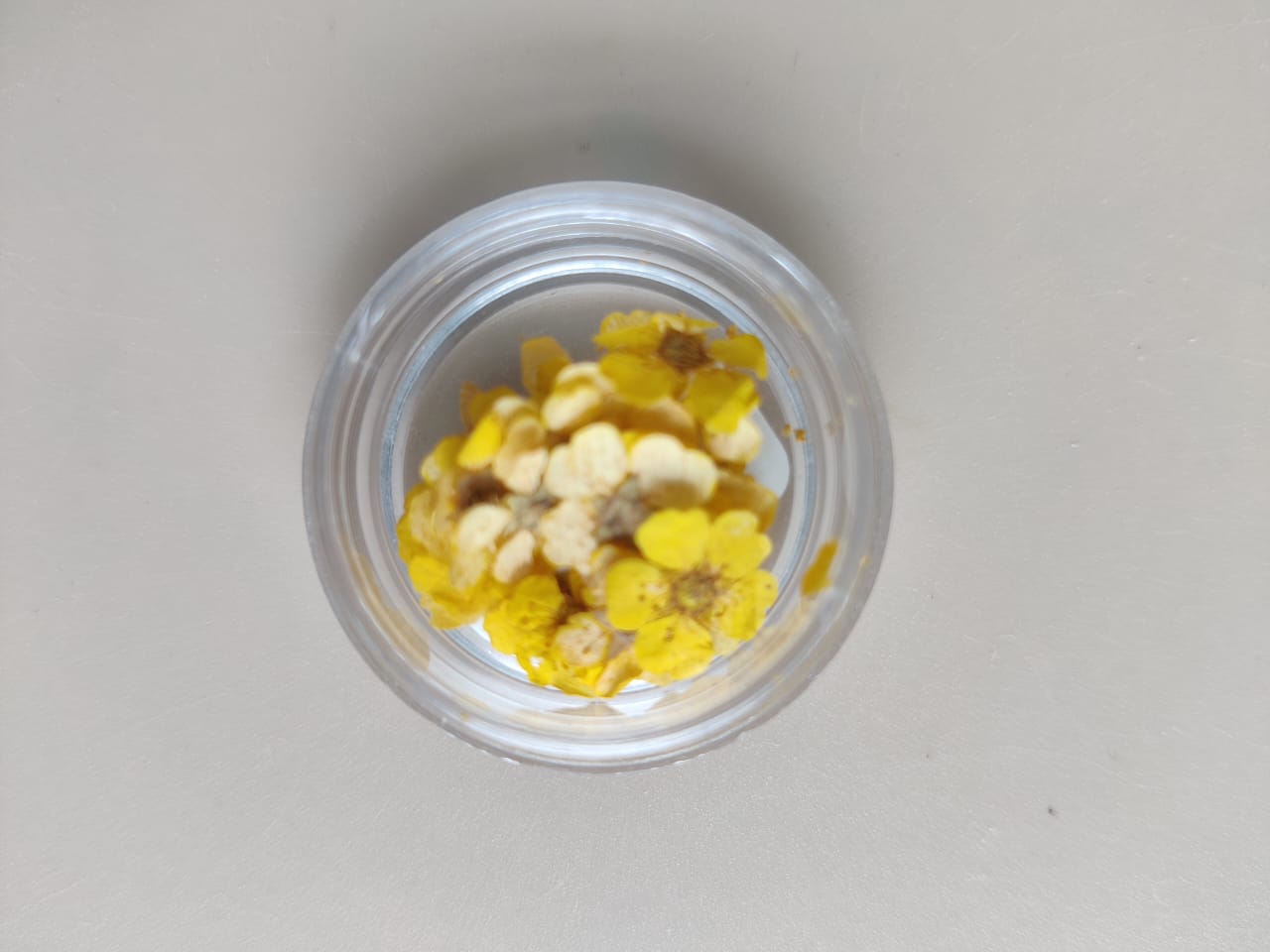 Tiny flower for jewellery - yellow