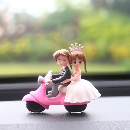 Couple on scooter Miniature