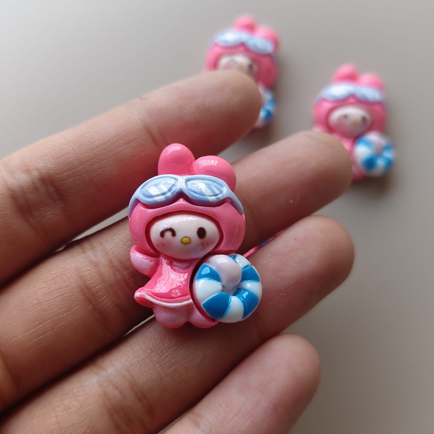 Pink kids Rakhi charms