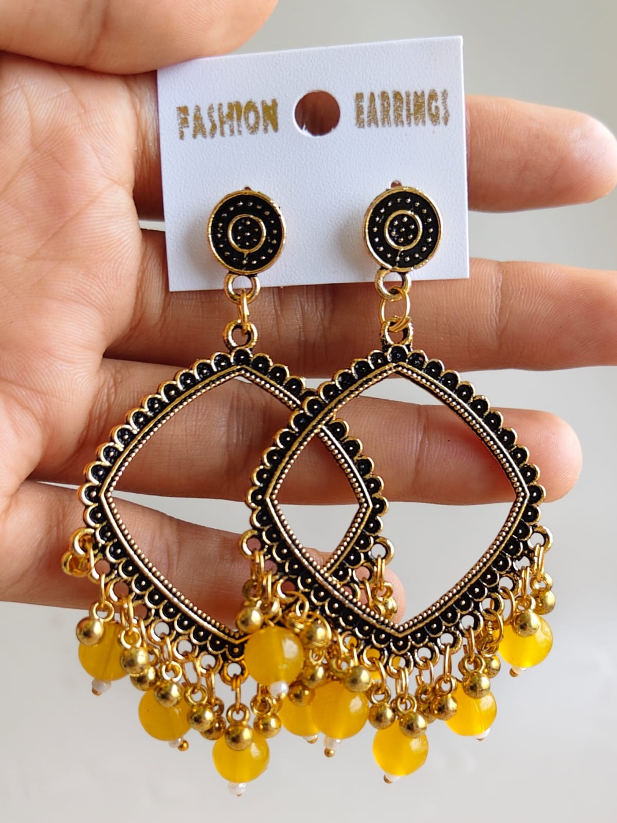 Jhumka/Earrings - Golden Base and colored Beads