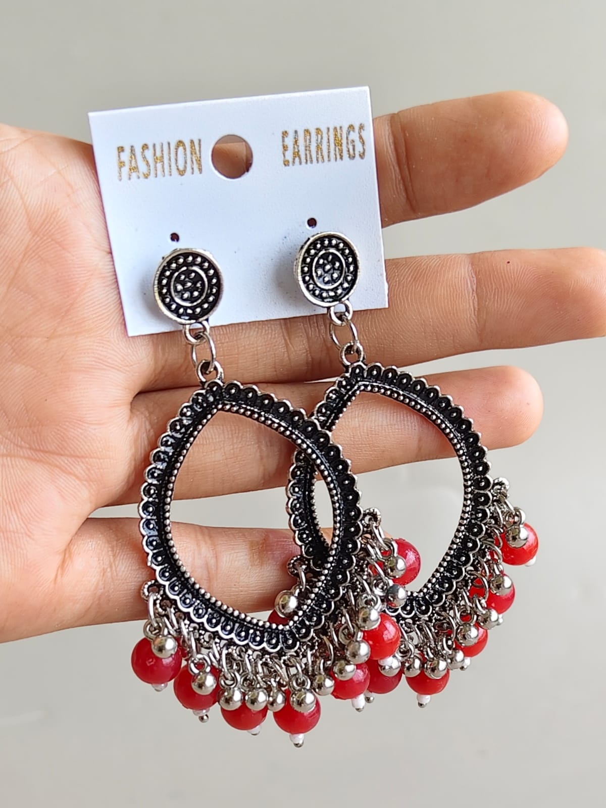 Oval Earrings/Jhumkas with silver base