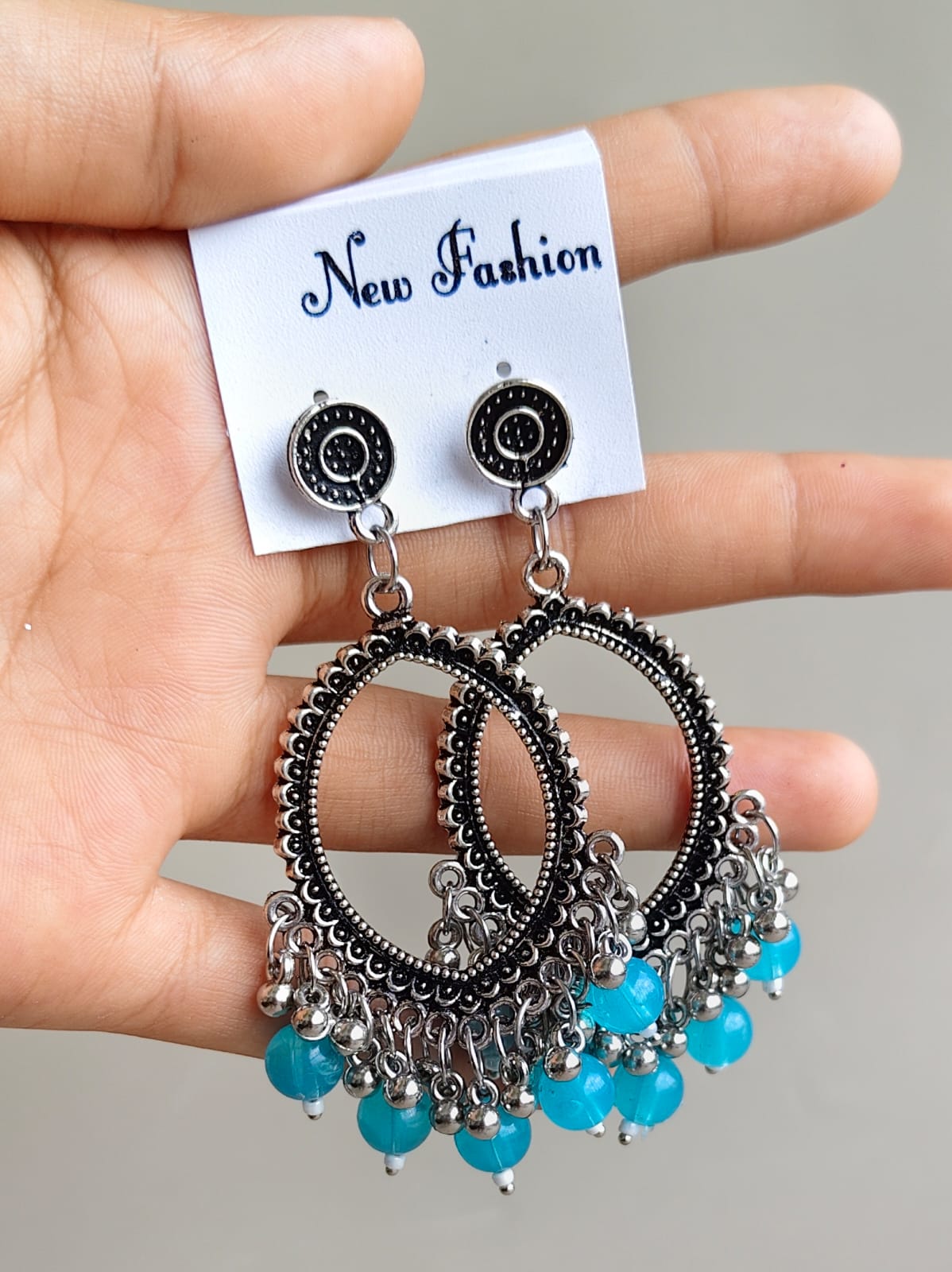 Oval Earrings/Jhumkas with silver base