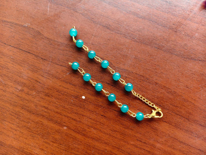 Moti bracelet rakhi chains - Multicolor