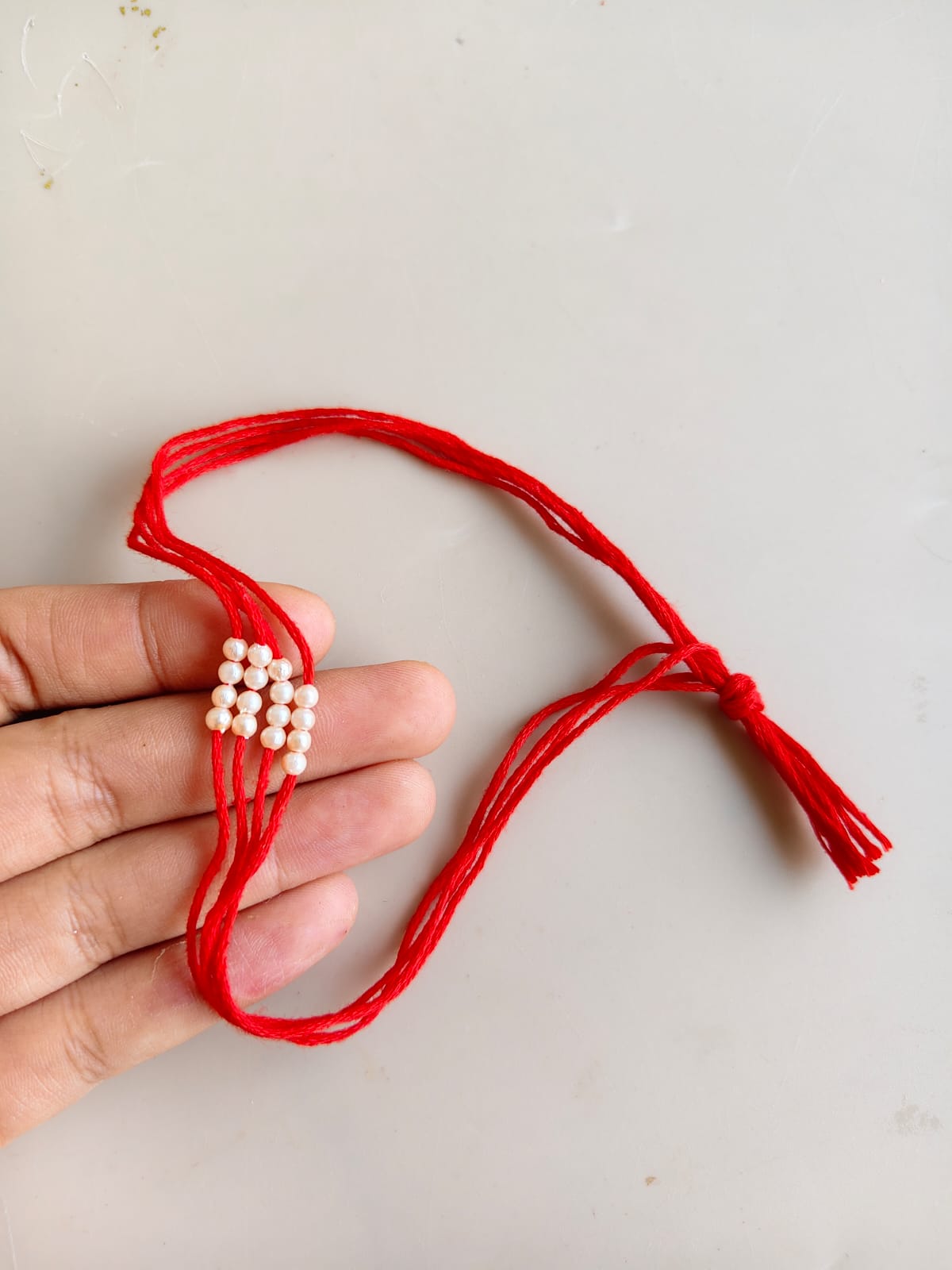 Rakhi thread with Moti - 4 pc