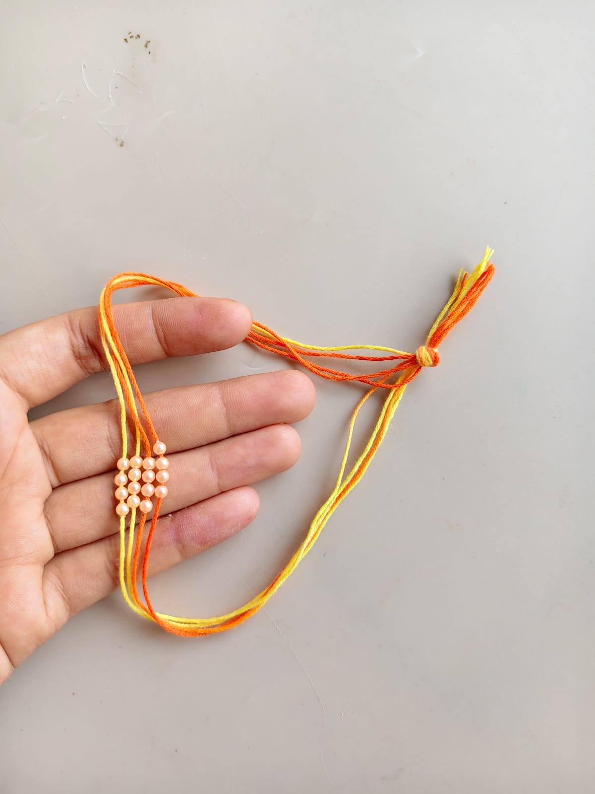 Rakhi thread with Moti - 4 pc