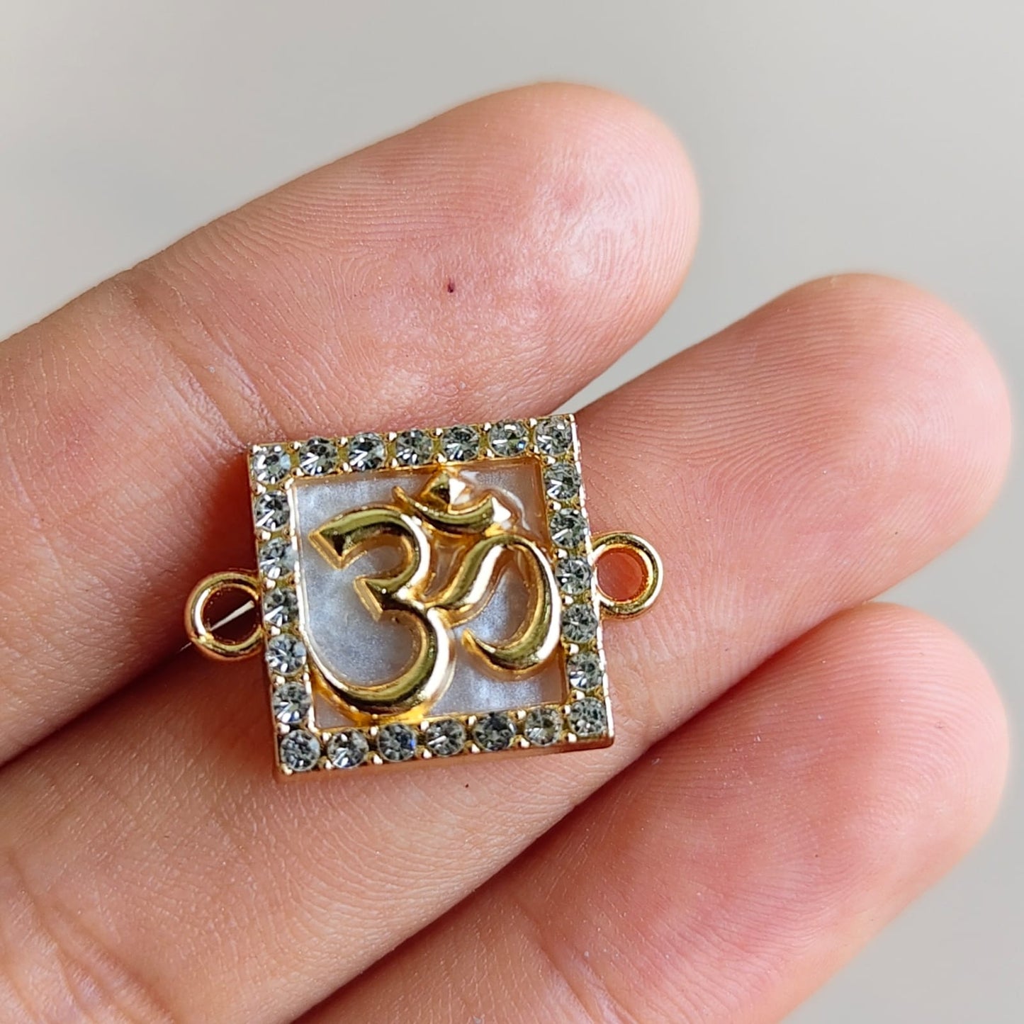 Om  Rakhi  charm