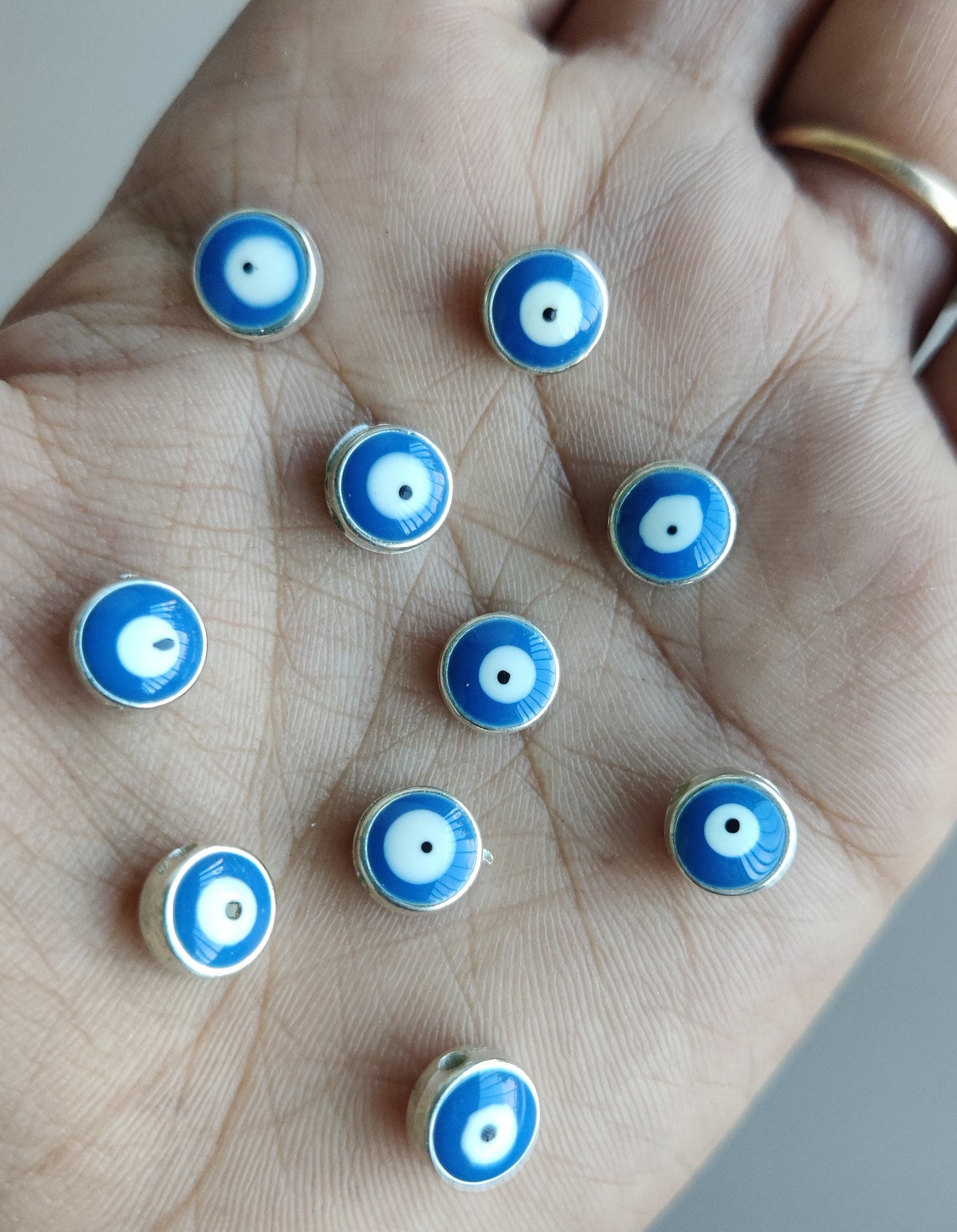 Evil eye metal charms