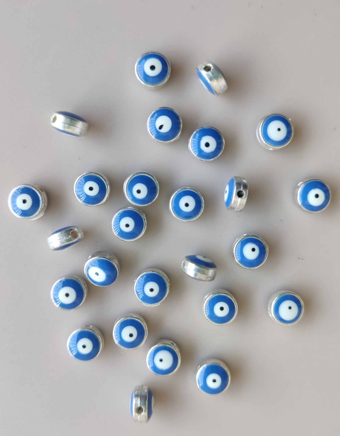 Evil eye metal charms