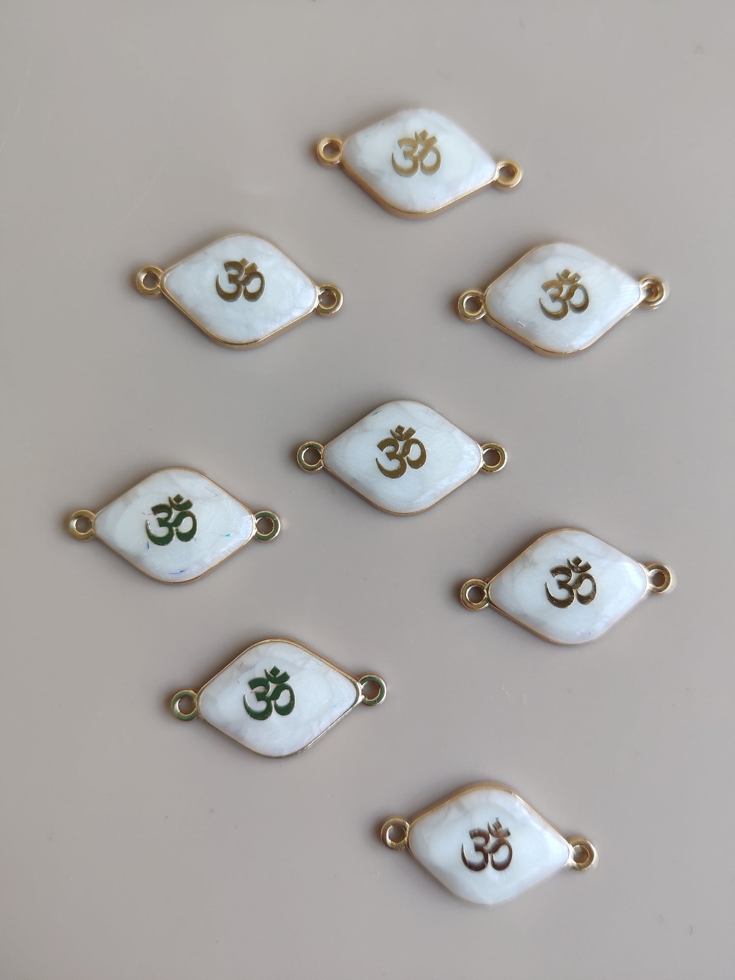 Ceramic charms OM - I