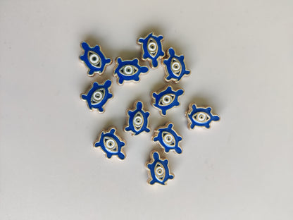 Evil eye tortoise charms